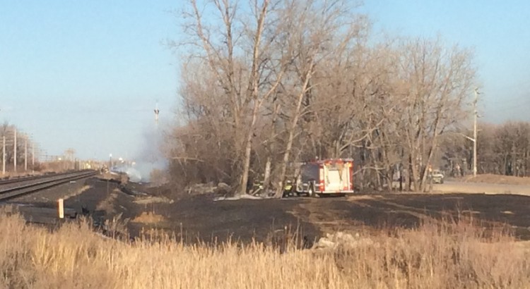 Fire crews were kept busy with a grass fire near the west perimeter Monday evening.